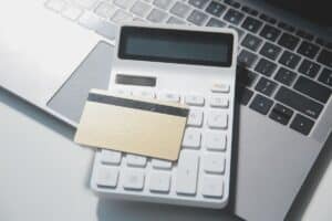 calculator-on-a-dark-background-plastic-cards-and-banknotes