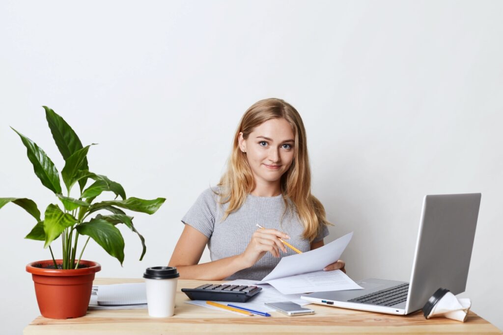 businesswoman-sitting-her-workplace