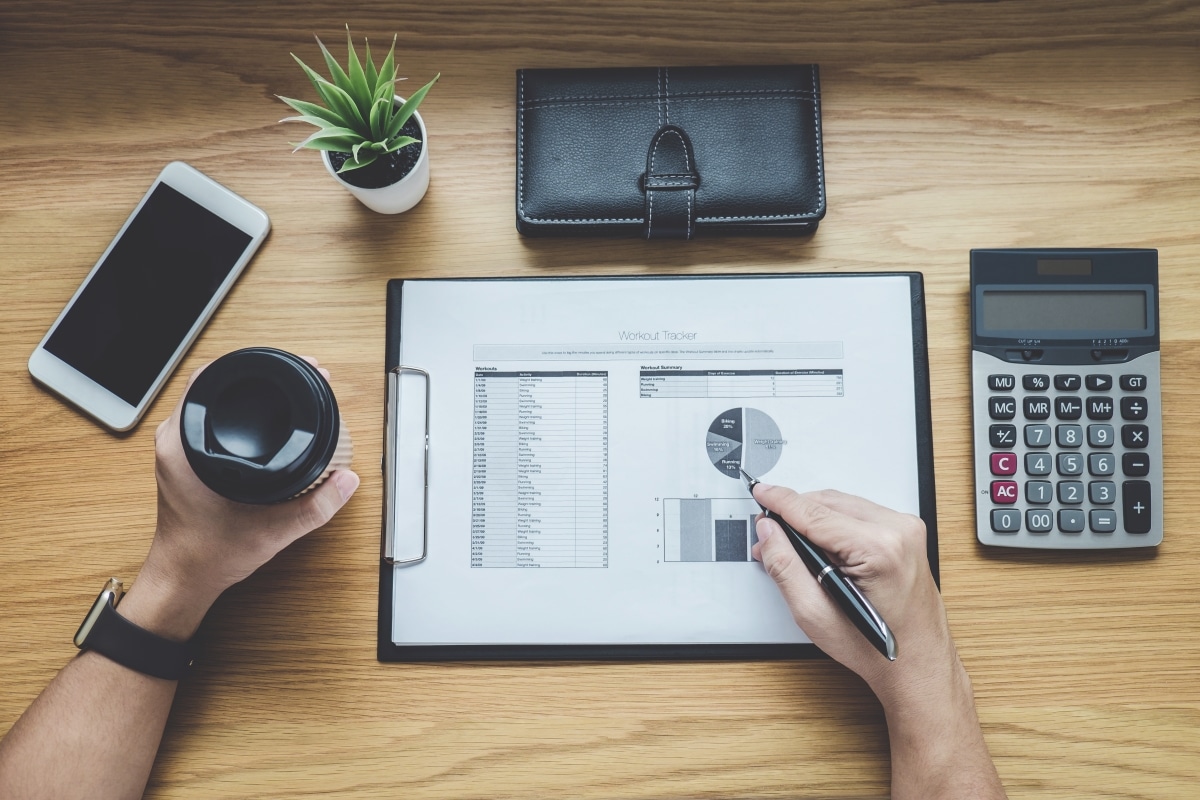 top-view-of-accountant-checking-a-report